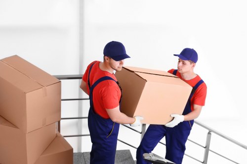 Professional movers assisting with a home move in Chiswick