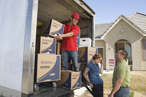Experienced movers handling furniture assembly